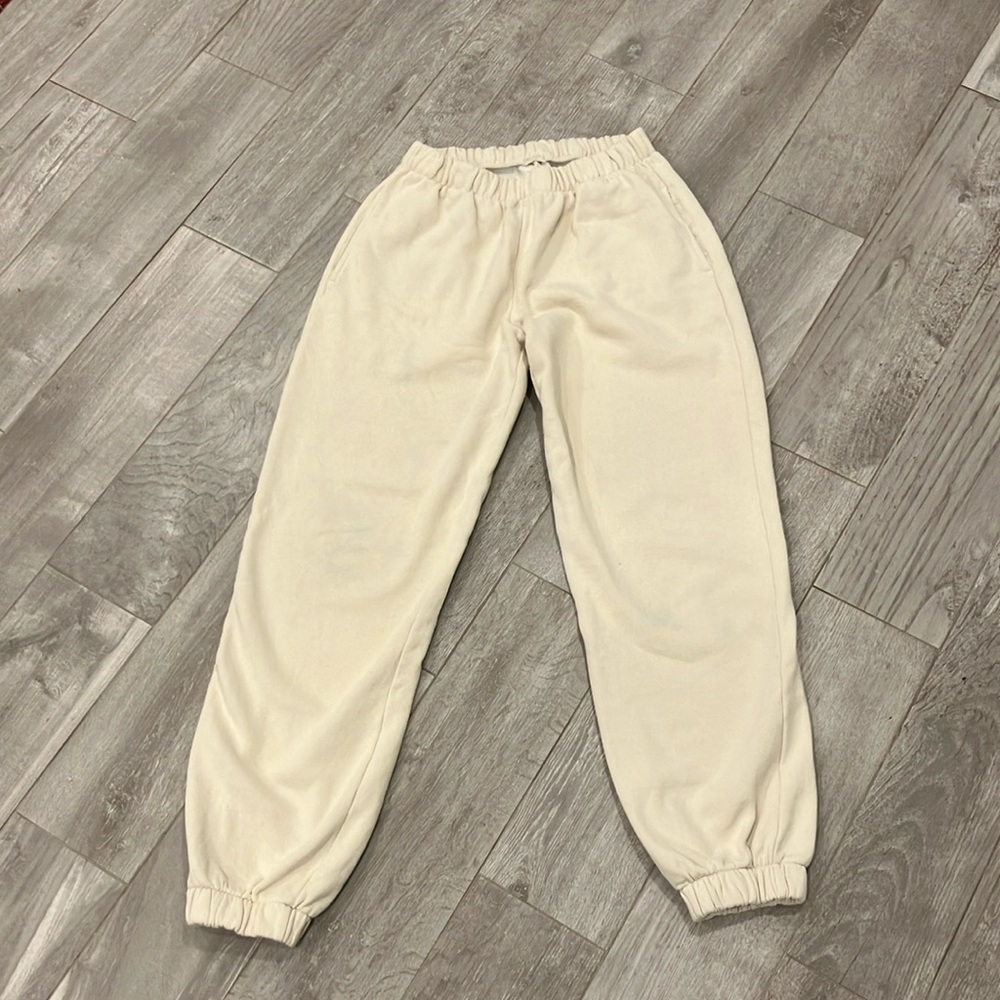 Cream colored Brandy Melville sweat pants.
